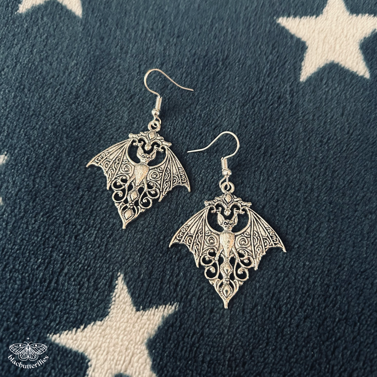 Silver Hollow Bat Earrings